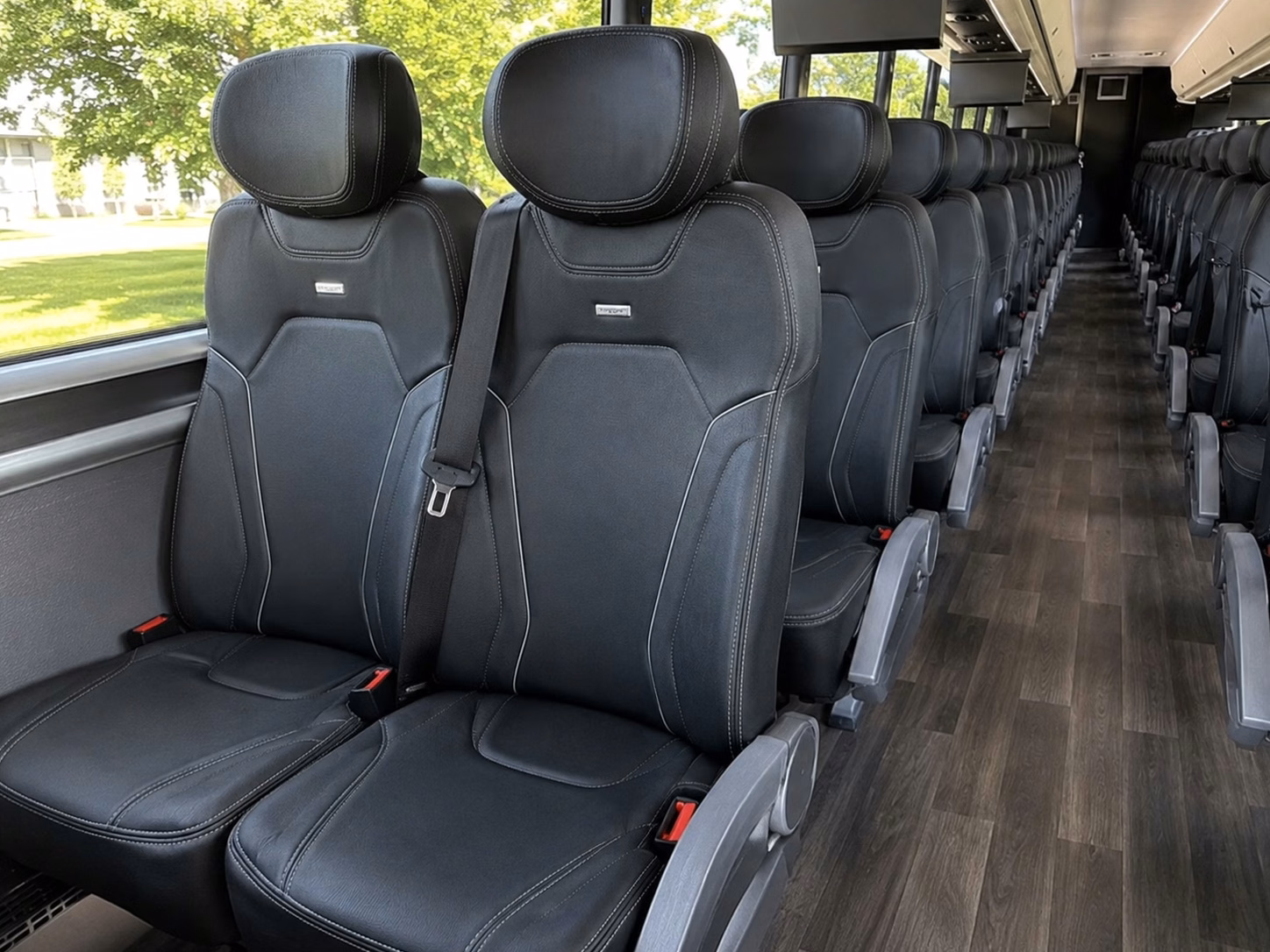 from frederik meijer gardens to the felt estate venue to venue wedding transportation in grand rapids